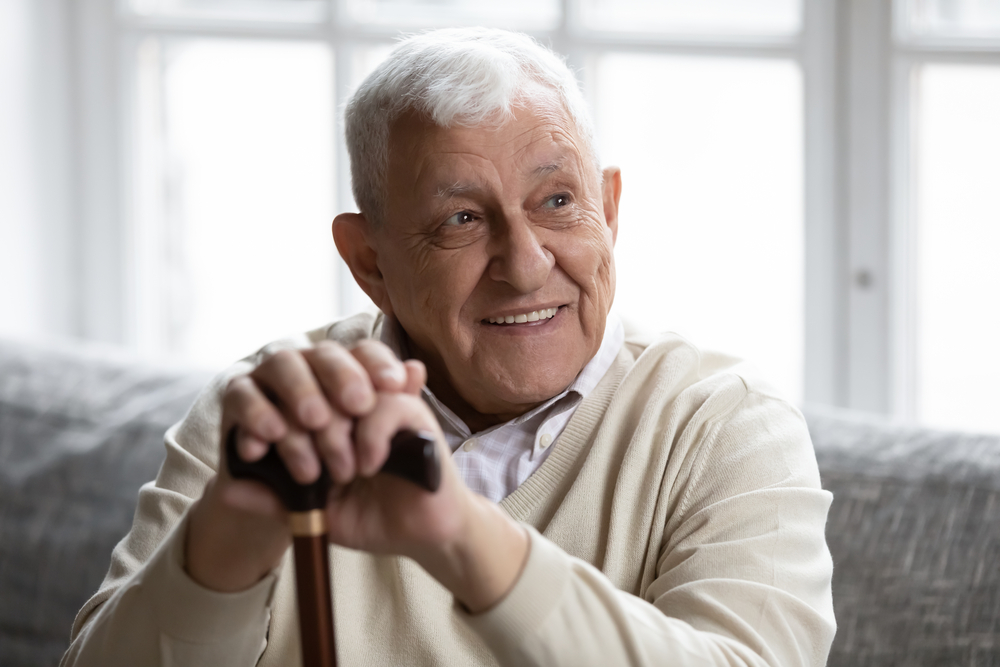 An old man being photographed